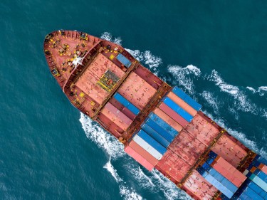 Aerial view of a container ship at sea