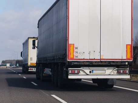 Semi trucks driving on a highway