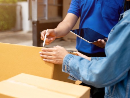 Courier handing over a package for delivery