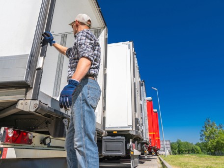 Man loading household goods into a truck